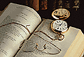 pocket watches lay on a Bible