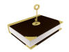 Bible with a key held over it