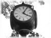  a picture of a clock outside