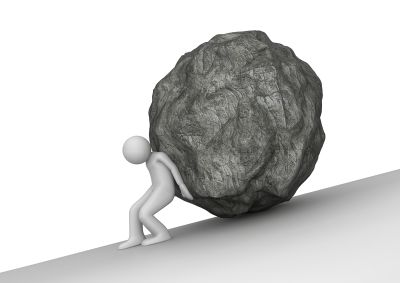  a picture of a man push a huge rock up hill
