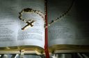 cross lay on a Bible